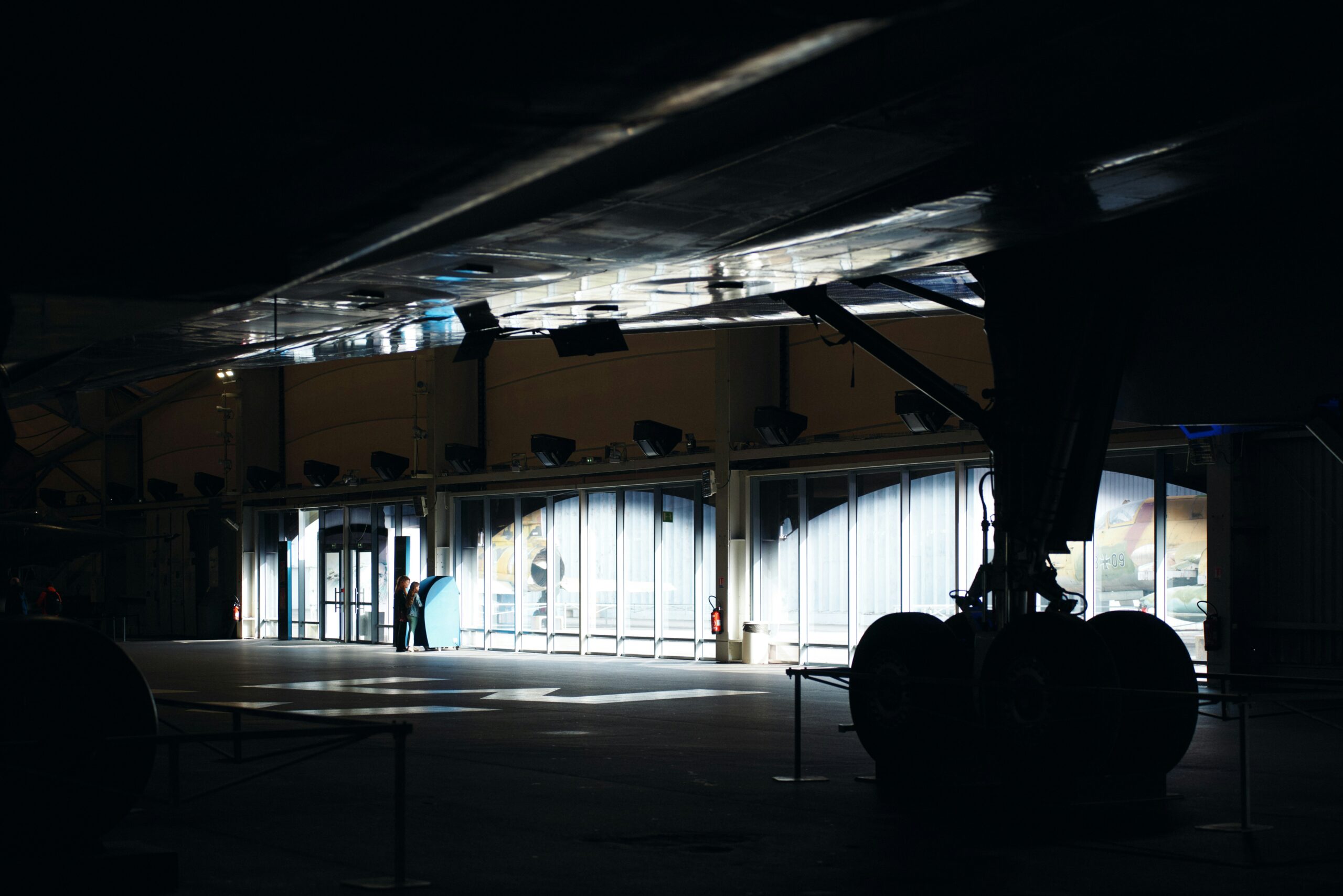 Aircraft landing gear inside an aviation maintenance hangar