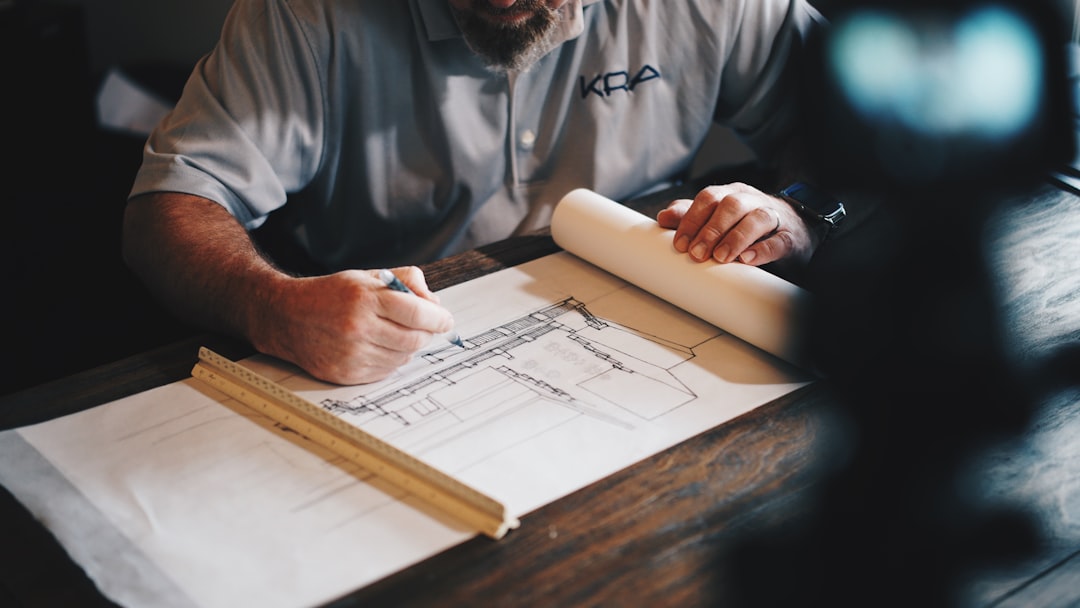 NSW builder reviewing construction plans before applying for HBCF project insurance