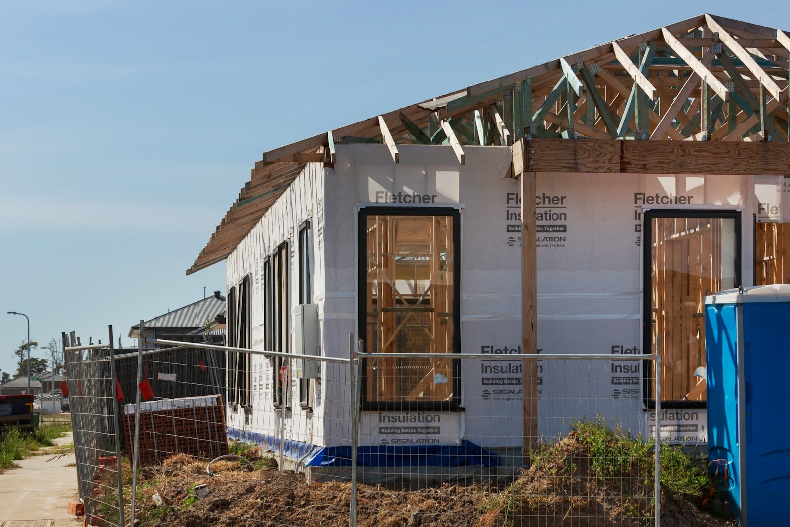 Residential construction site and building materials for owner builder insurance