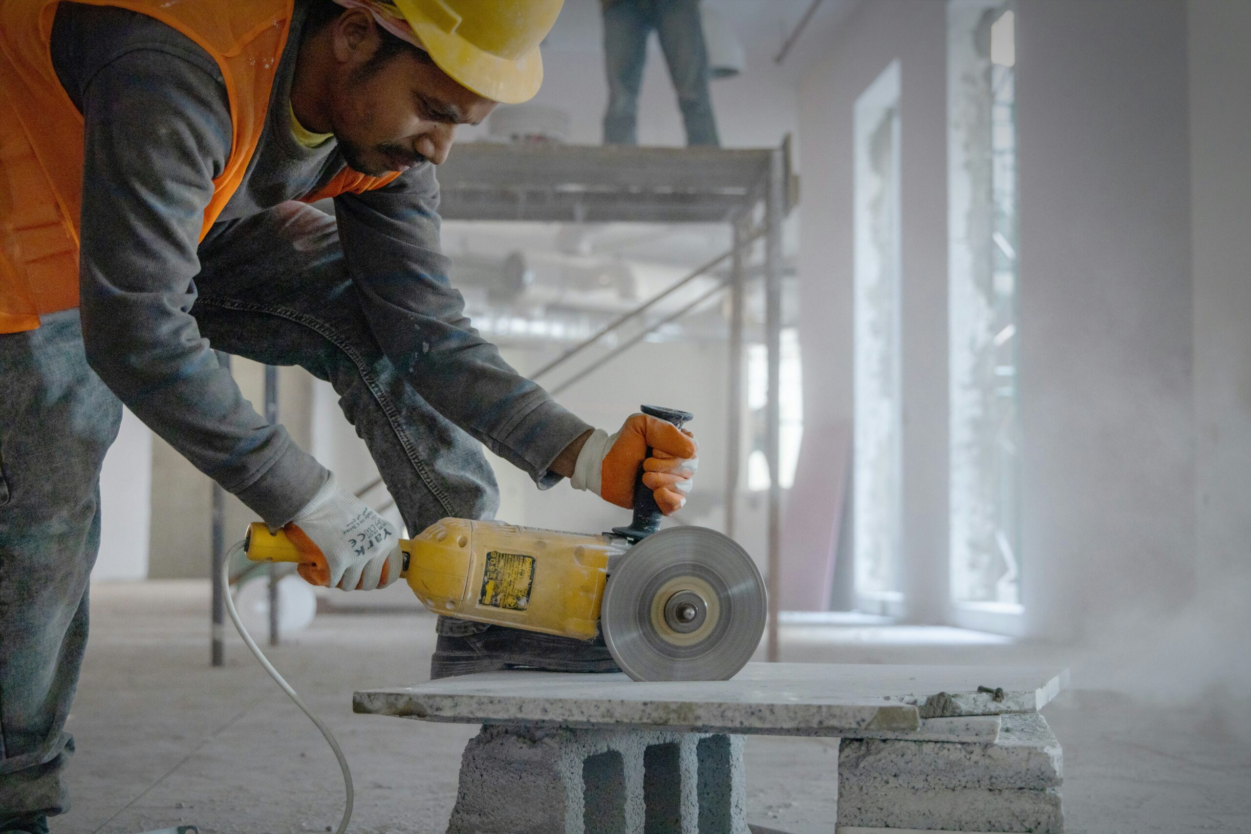 Construction worker and civil engineer on a commercial worksite in Australia